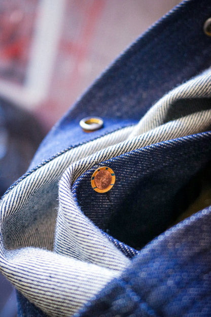 DENIM FOLD-OVER BACKPACK - NYLON STRAPS