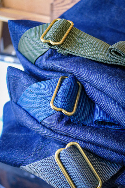 DENIM FOLD-OVER BACKPACK - NYLON STRAPS